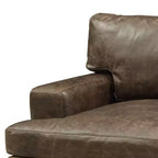 Poltrona di design in pelle marrone invecchiata