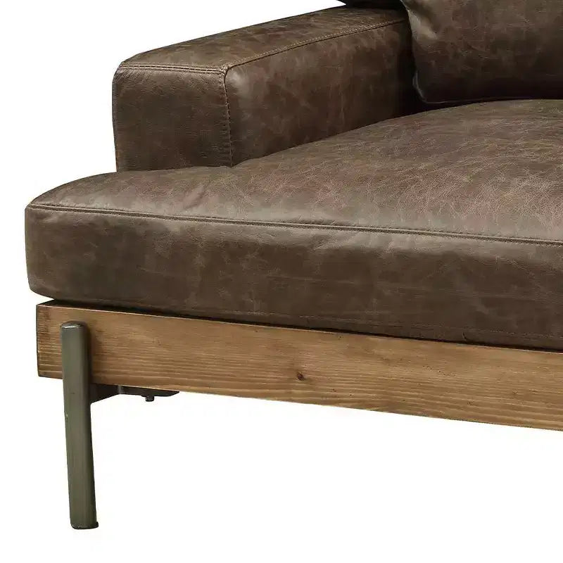 Poltrona di design in pelle marrone invecchiata