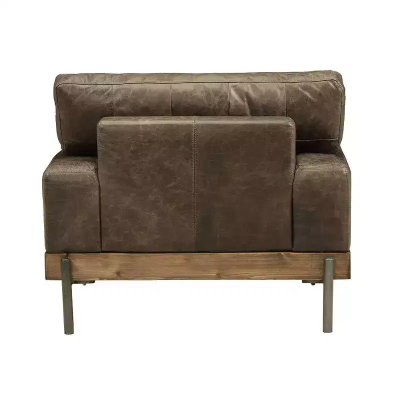 Poltrona di design in pelle marrone invecchiata
